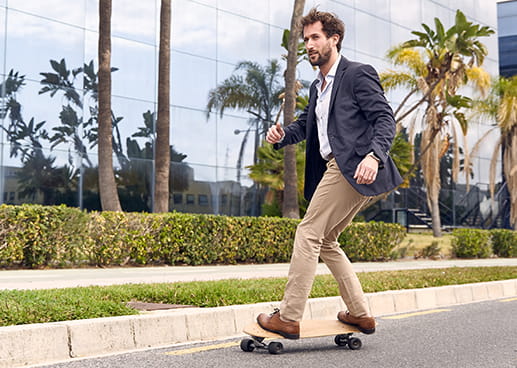 executive on a skateboard