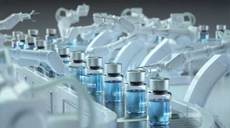 vials of medicine on assembly line