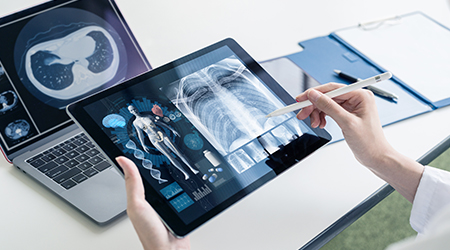 Leader in Healthcare Systems Grows Uptime and Security with Docker and AWS