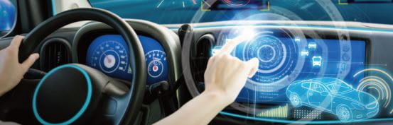 hand touching digital screen in car